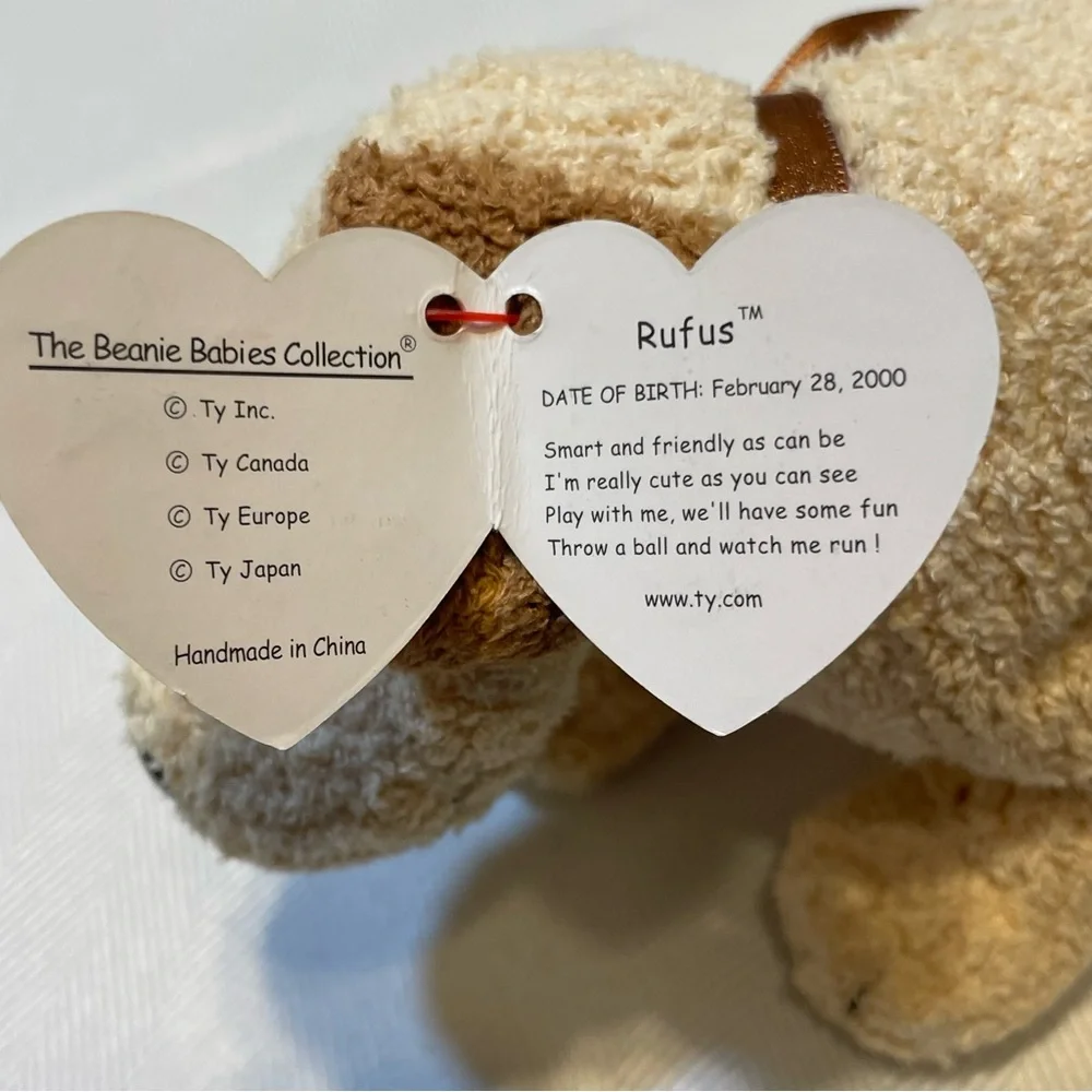Ty Beanie Baby Dog Rufus. Tan and brown NWT